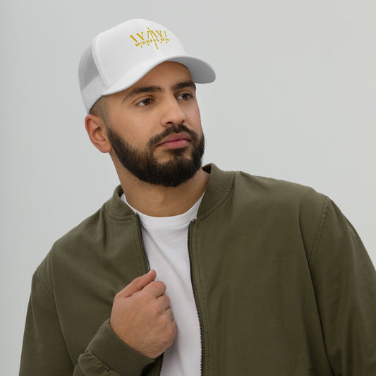Winners Win white cap with the original Winners Win logo embroidered in gold